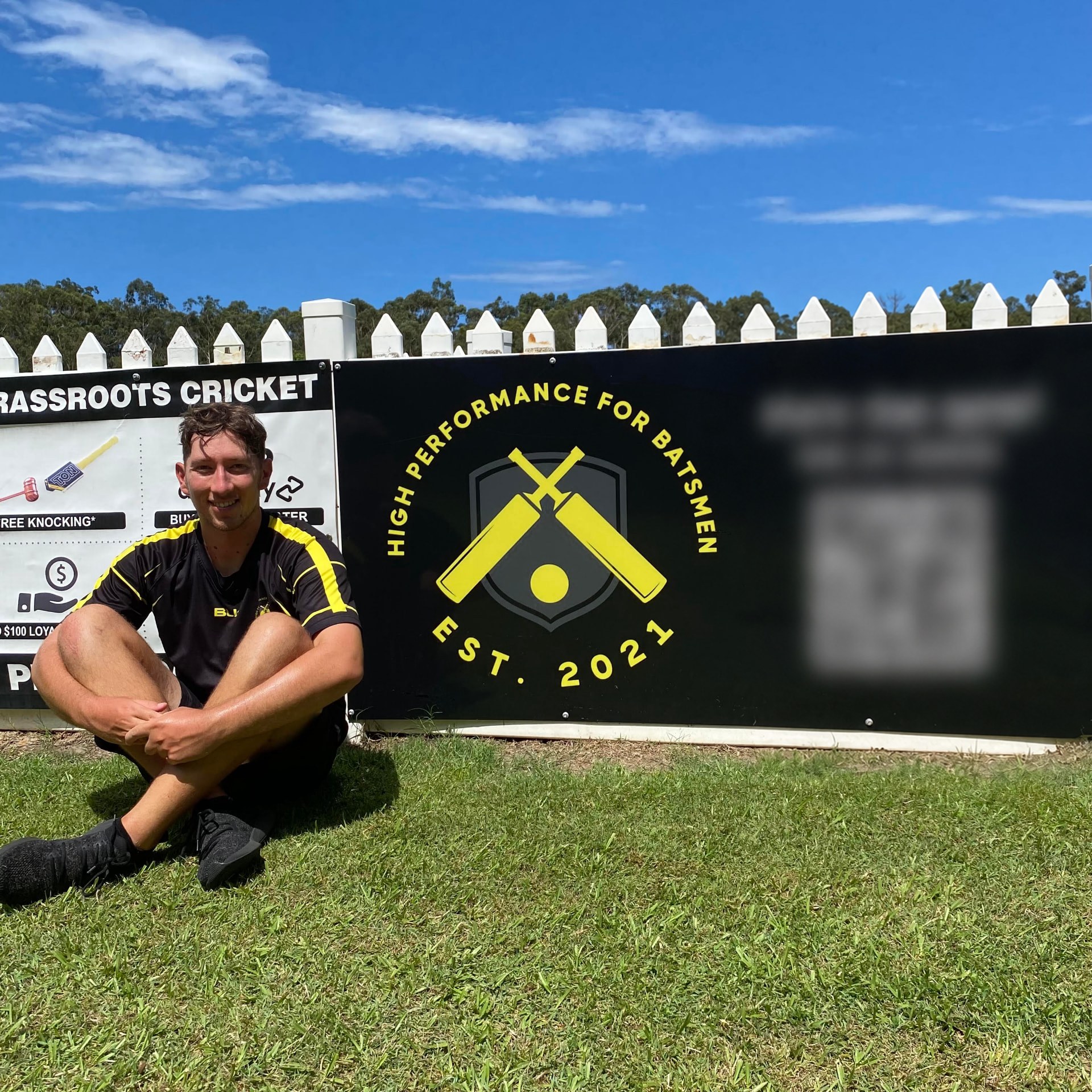Jarrod beside the High Performance for Batsmen banner
